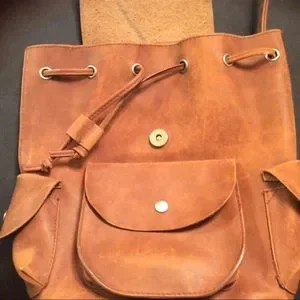 Mossimo brown leather backpack10.5”x10”x4” Mossimo brown leather backpack 11”x9”x4” Magnetic snap and  main image 3